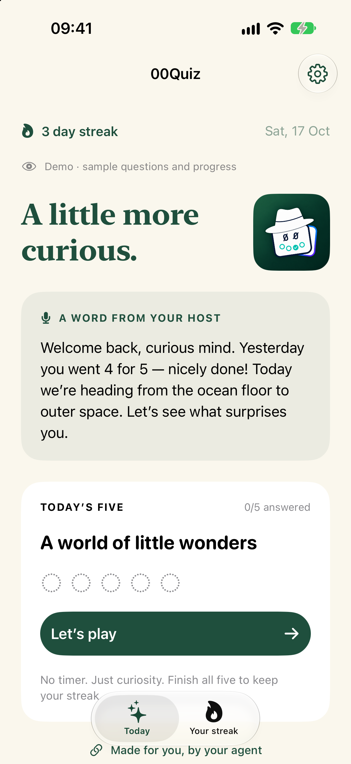 00Quiz on iPhone showing a three day streak, a welcome message from the quiz host, and today’s five questions titled A world of little wonders.